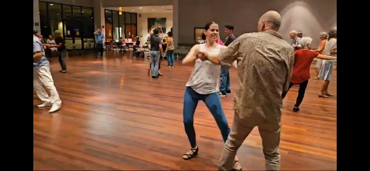 Dancers rotating partners during open dancing at the Palladium